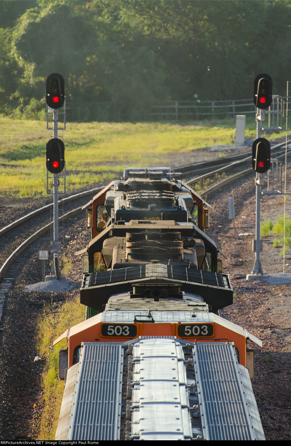 BNSF 503 and 3198 are eastbound passing the Amtrak Station and the old Burlington Depot 